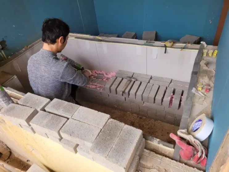 Four Air Conditioners and a Brick Bench in the Tub — photo 5