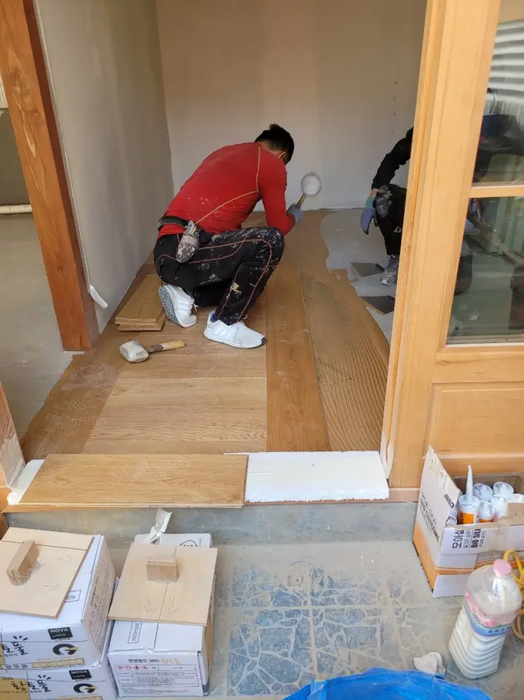 Hardwood Over Red Clay Paste: The Floor Goes In — photo 4