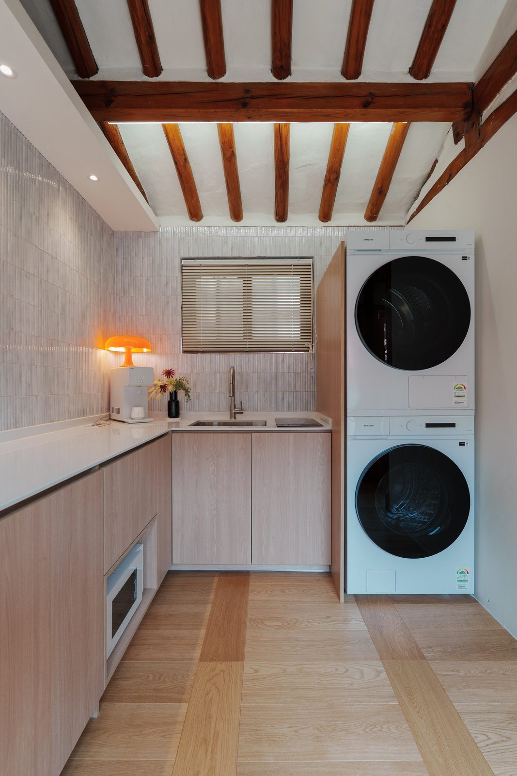 Kitchen with washer and dryer